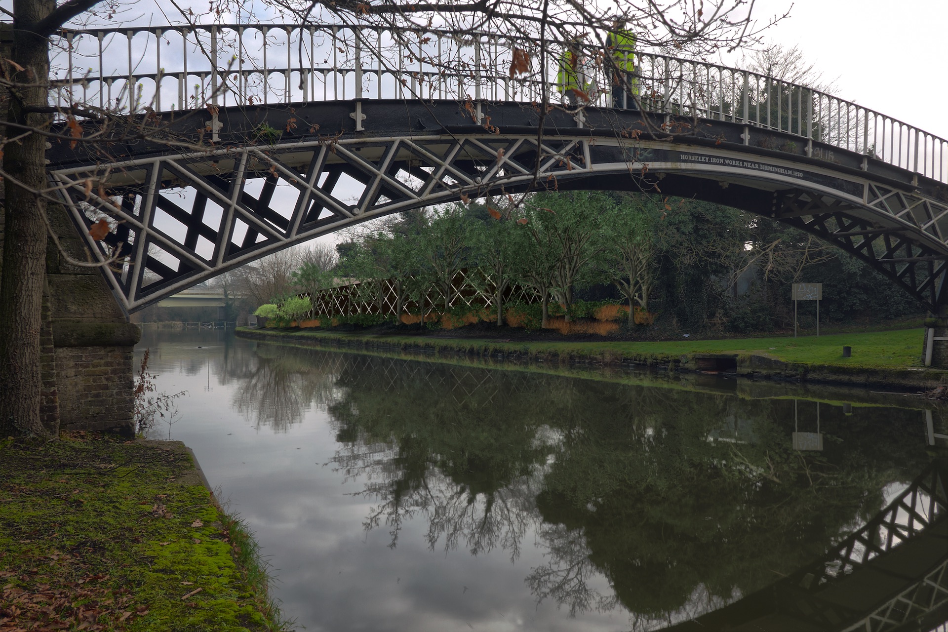 View through listed pedestrian bridge to visualisation of the new perimeter wall. 